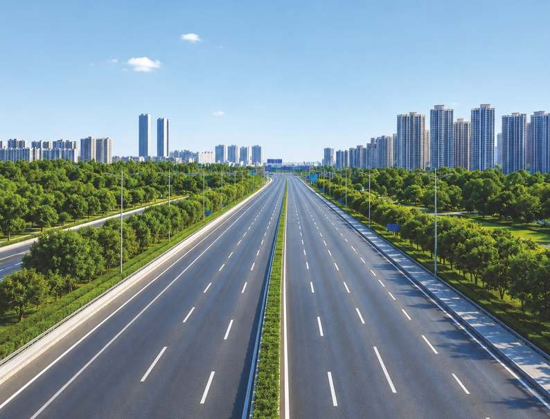 Completed dual-carriageway highway with landscaped median, executed by DHD Infracon